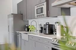 City View 1BR I Gym I Free Parking I Workspace - Image 3