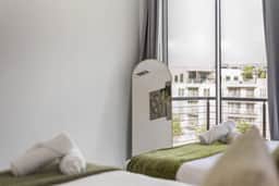 City View 2BR I Parking I King Bed I Workspace - Image 2