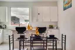 Metro View 2BR | Free Parking I King Bed Workspace - Image 2