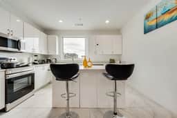 Metro View 2BR | Free Parking I King Bed Workspace - Image 3