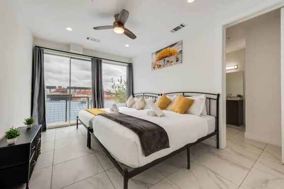 Metro View 2BR | Free Parking I King Bed Workspace - Image 5